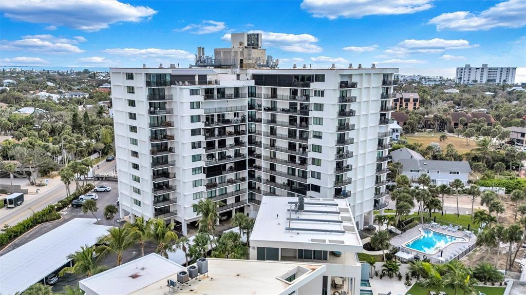 4822 Ocean Boulevard, Unit 8D Siesta Key, FL 34242 - Photo 5 of 69 a city view with tall buildings