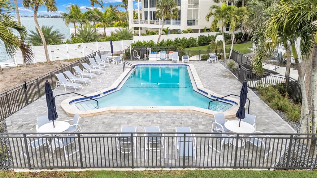 4822 Ocean Boulevard, Unit 8D Siesta Key, FL 34242 - Photo 62 of 69 swimming pool view with a seating space
