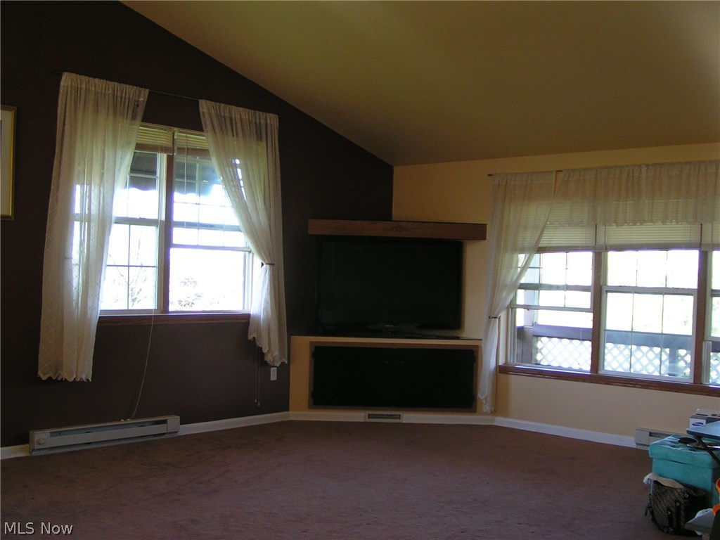 4047 Vandemark Road Litchfield, OH 44253 - Photo 2 of 19 View 2 of the Great Room shows a built in area for a television. Lots of windows to let the light in.