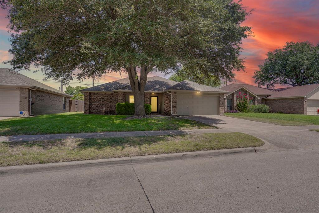 804 Simon Drive Cedar Hill, TX 75104 - Photo 1 of 1 front view of house with a yard