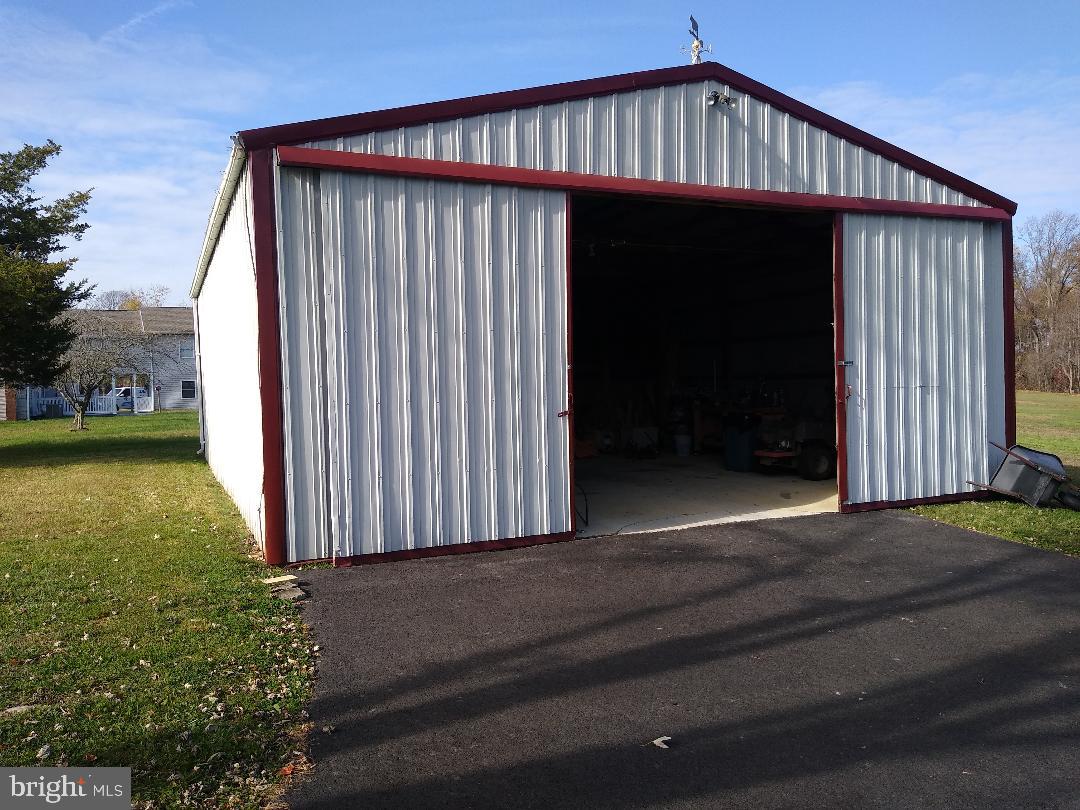 9545 Dubois Road Charlotte Hall, MD 20622 - Photo 27 of 32 Front view of metal building