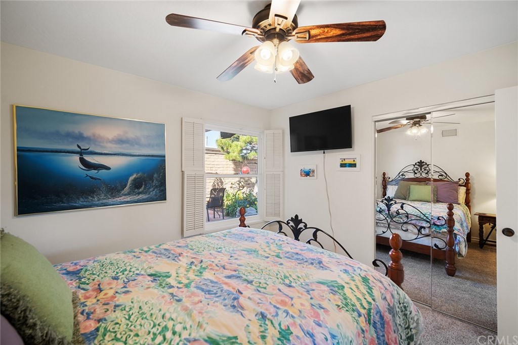 23892 Taranto Bay Dana Point, CA 92629 - Photo 27 of 73 a bedroom that has a bed and a flat screen tv