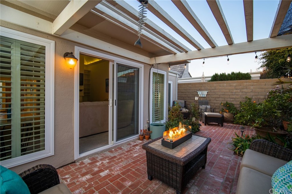 23892 Taranto Bay Dana Point, CA 92629 - Photo 51 of 73 a building outdoor space with patio furniture and potted plants