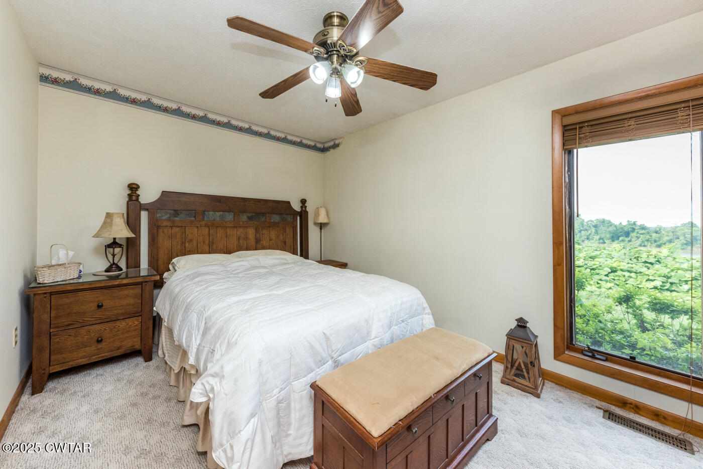 3490 Coffee Landing Road Morris Chapel, TN 38361 - Photo 18 of 39 a bedroom with a bed and a window