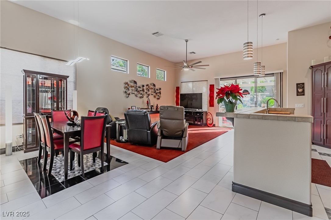 17 Chatmoss Road Henderson, NV 89052 - Photo 12 of 58 Dining room featuring a ceiling fan and visible vents