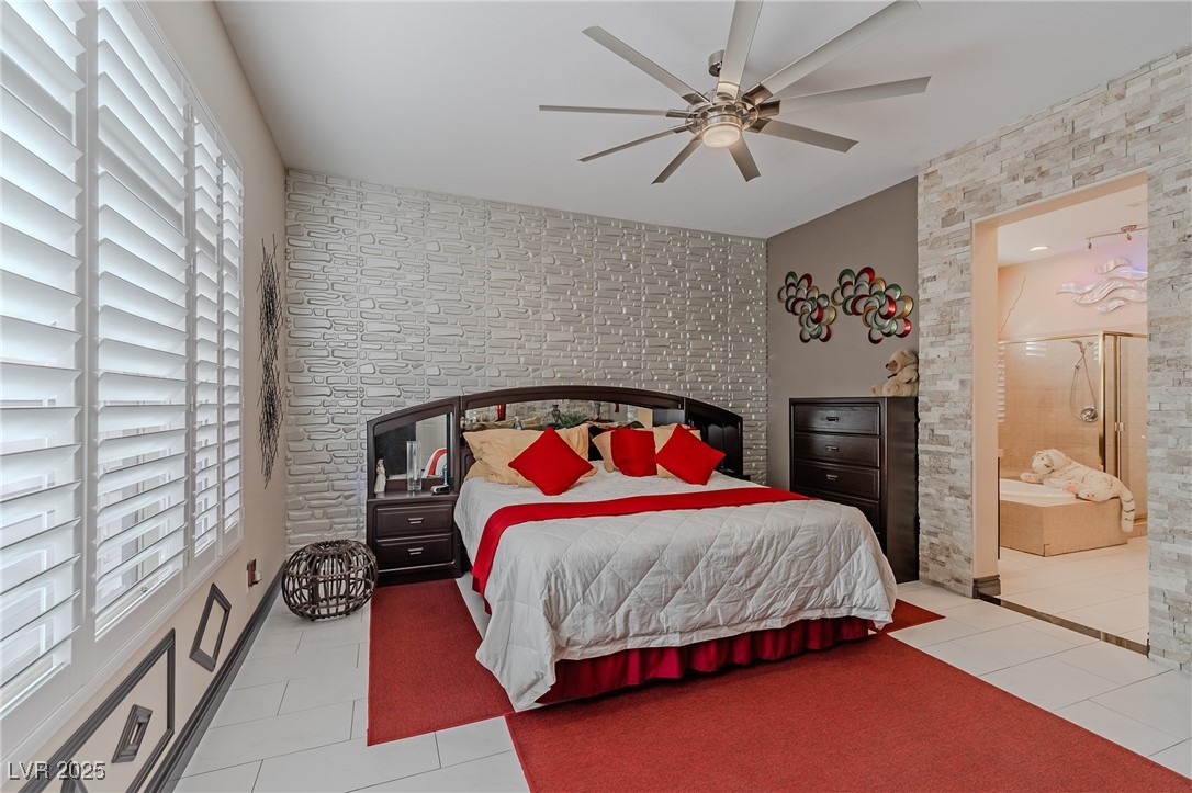 17 Chatmoss Road Henderson, NV 89052 - Photo 20 of 58 Bedroom with tile patterned flooring and ceiling fan
