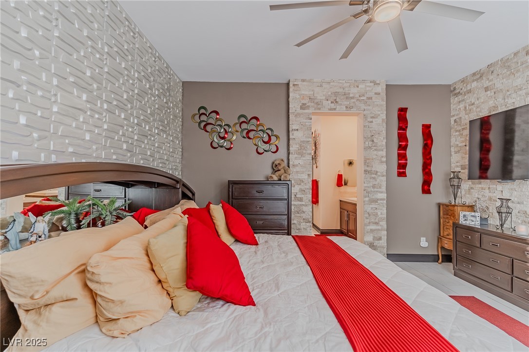 17 Chatmoss Road Henderson, NV 89052 - Photo 21 of 58 Bedroom featuring a ceiling fan and ensuite bath
