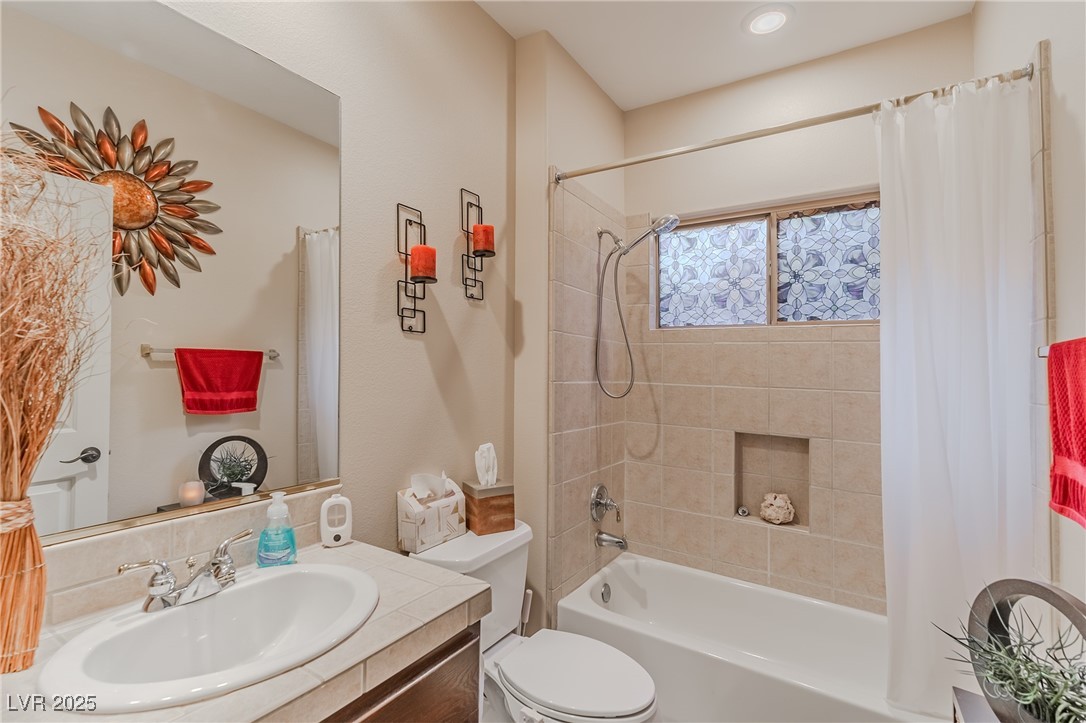 17 Chatmoss Road Henderson, NV 89052 - Photo 29 of 58 Bathroom with shower / tub combo, toilet, and vanity