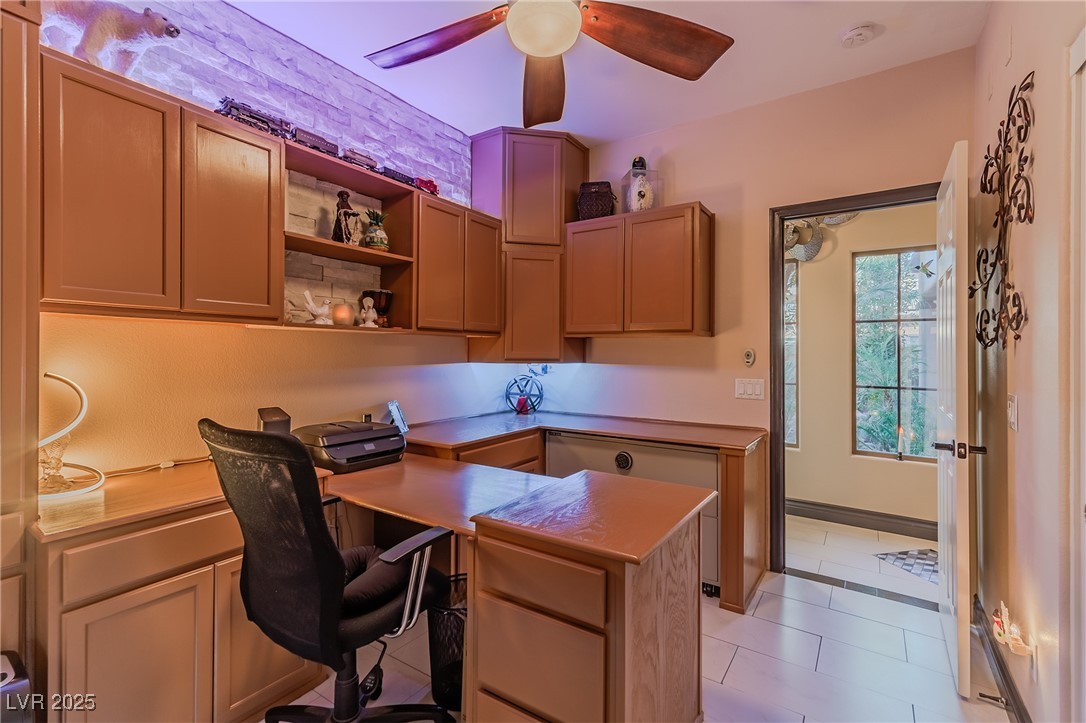 17 Chatmoss Road Henderson, NV 89052 - Photo 31 of 58 Home office with light tile patterned floors and a ceiling fan