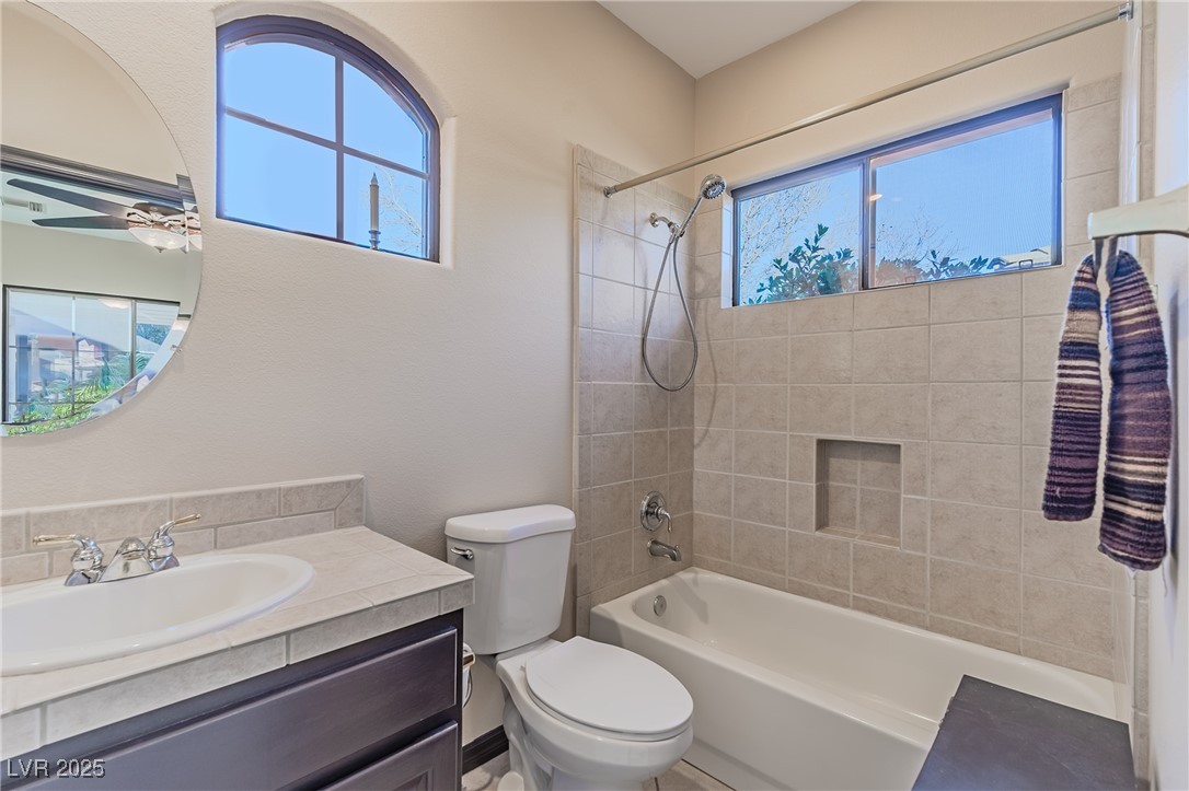 17 Chatmoss Road Henderson, NV 89052 - Photo 35 of 58 Full bath with ceiling fan, toilet, shower / tub combination, and vanity