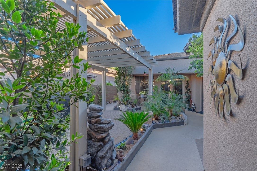 17 Chatmoss Road Henderson, NV 89052 - Photo 4 of 58 View of patio featuring a pergola