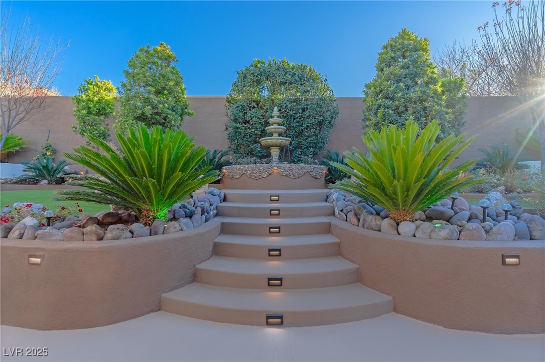 17 Chatmoss Road Henderson, NV 89052 - Photo 43 of 58 View backyard with water feature