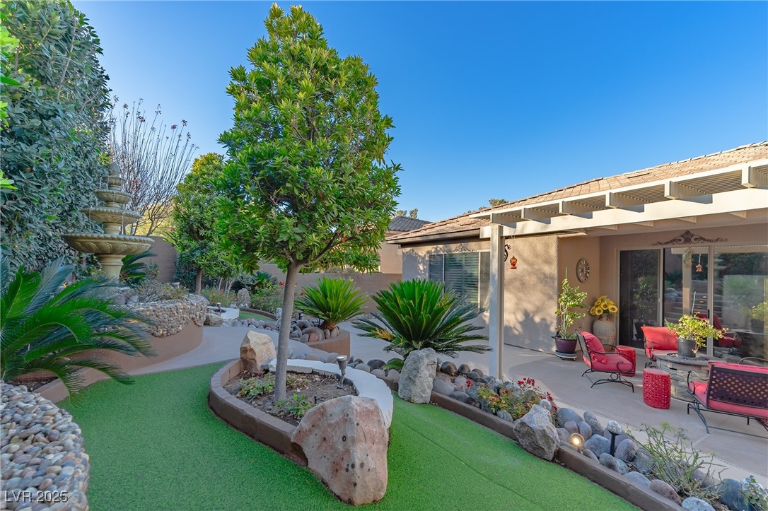17 Chatmoss Road Henderson, NV 89052 - Photo 46 of 58 View of yard with a patio