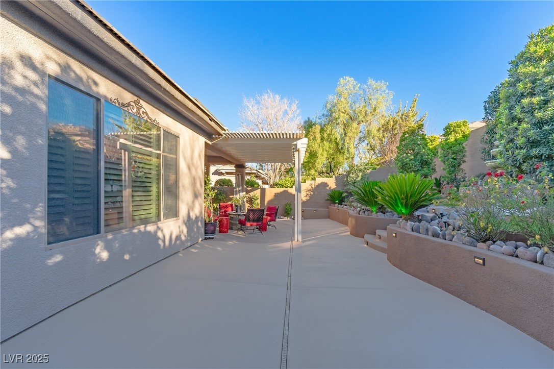 17 Chatmoss Road Henderson, NV 89052 - Photo 48 of 58 View of patio / terrace featuring a pergola and a fenced backyard