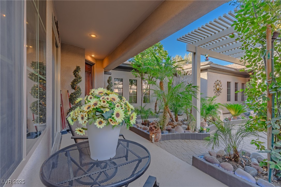 17 Chatmoss Road Henderson, NV 89052 - Photo 8 of 58 View of patio / terrace featuring a pergola
