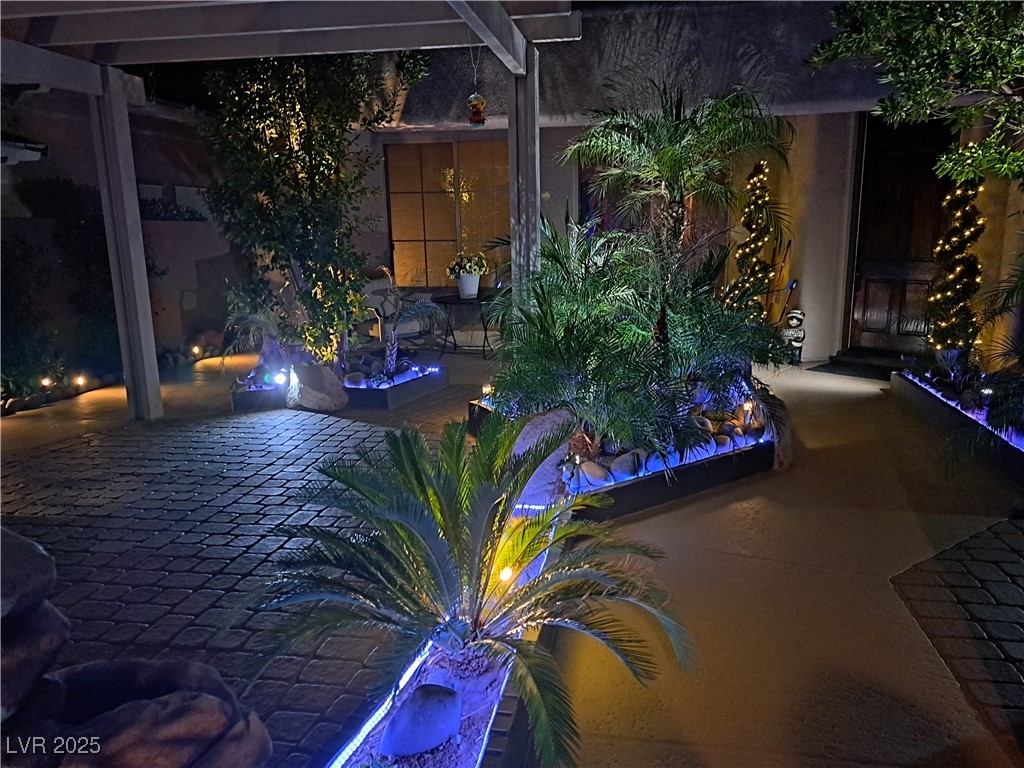 17 Chatmoss Road Henderson, NV 89052 - Photo 9 of 58 View courtyard at night with LED lighting