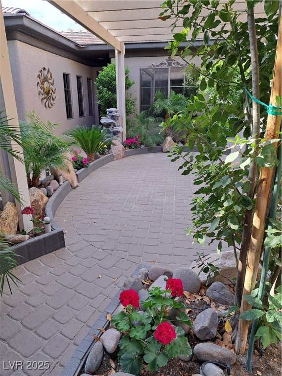 17 Chatmoss Road Henderson, NV 89052 - Photo 10 of 58 View of patio / terrace with a pergola