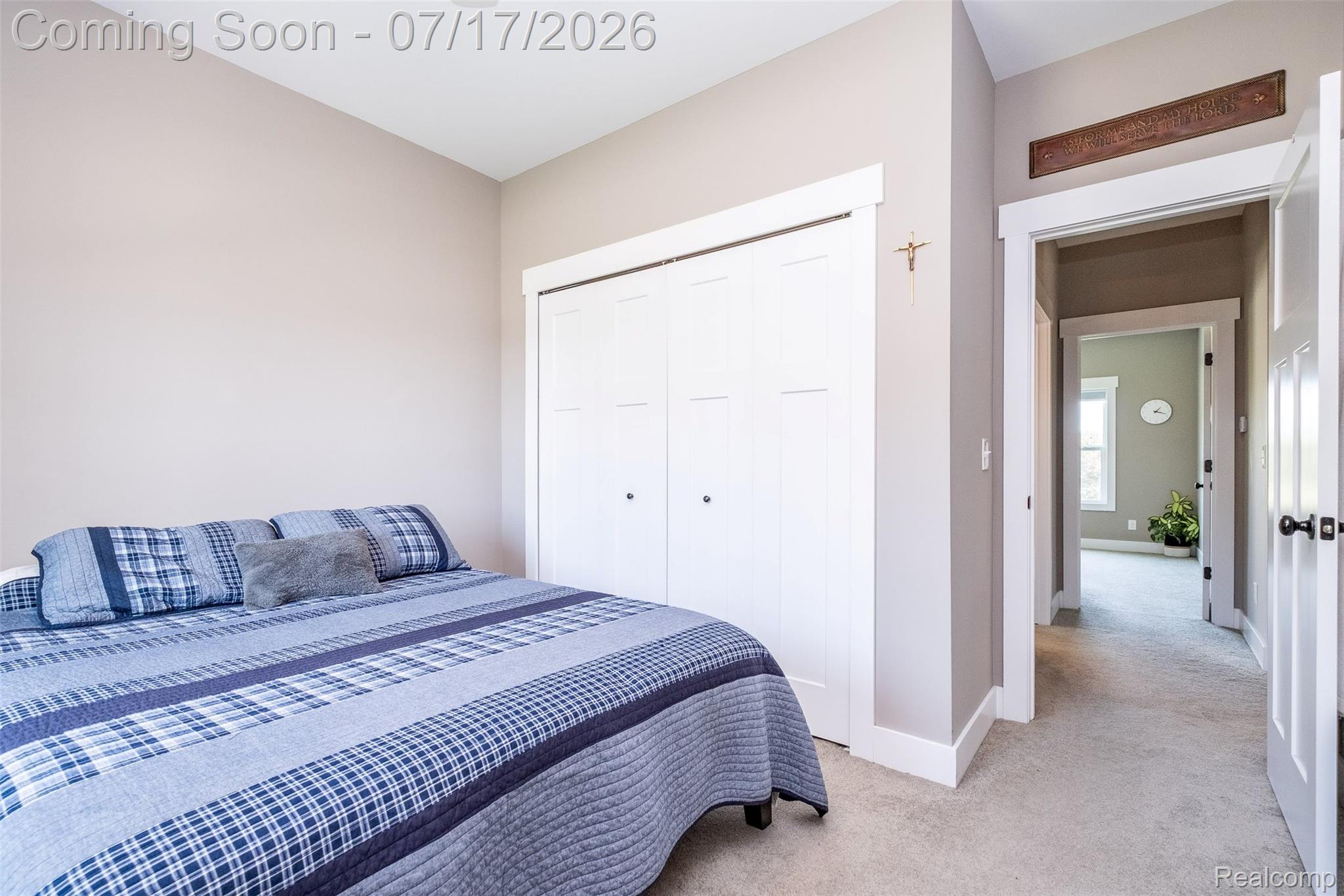 12349 Sugar Maple Drive Fenton, MI 48430 - Photo 32 of 67 Light-toned wall paint with white trim throughout, featuring a built-in closet with bifold doors