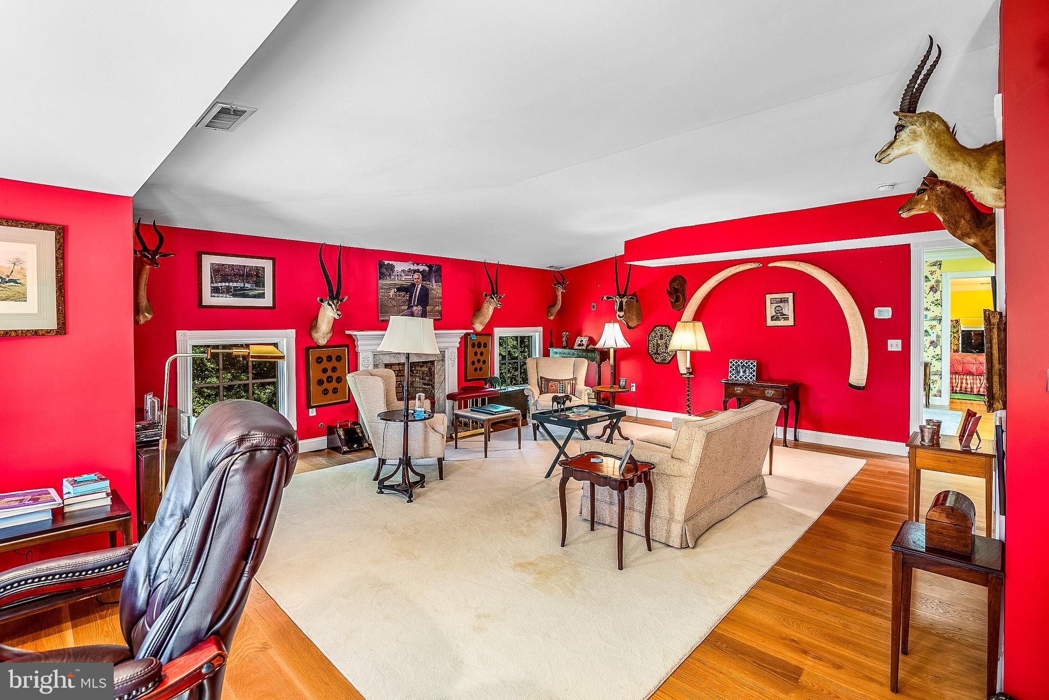 11470 Wye Heights Road Easton, MD 21601 - Photo 35 of 61 a living room with furniture a rug and white walls
