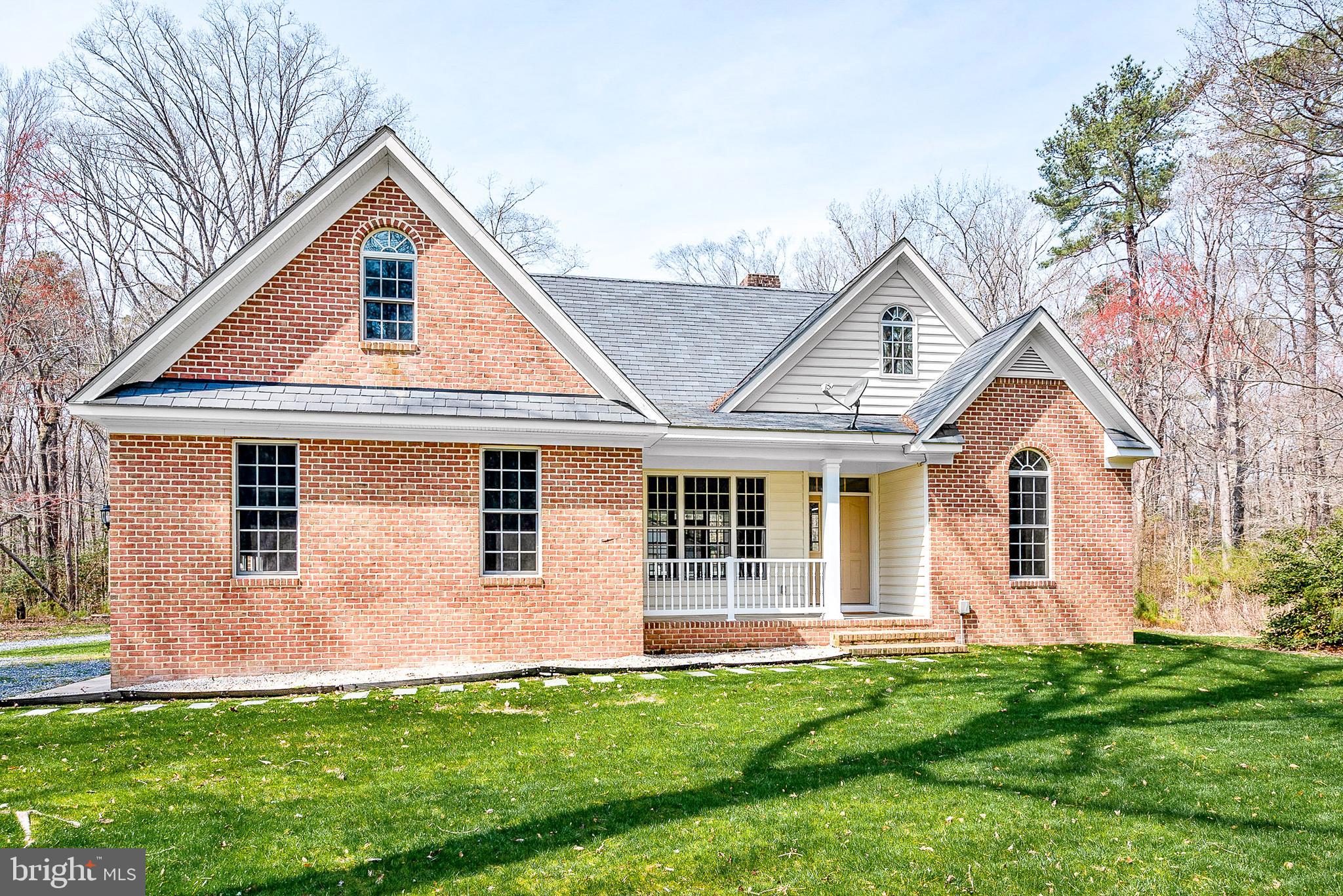 11470 Wye Heights Road Easton, MD 21601 - Photo 54 of 61 a front view of a house with a yard