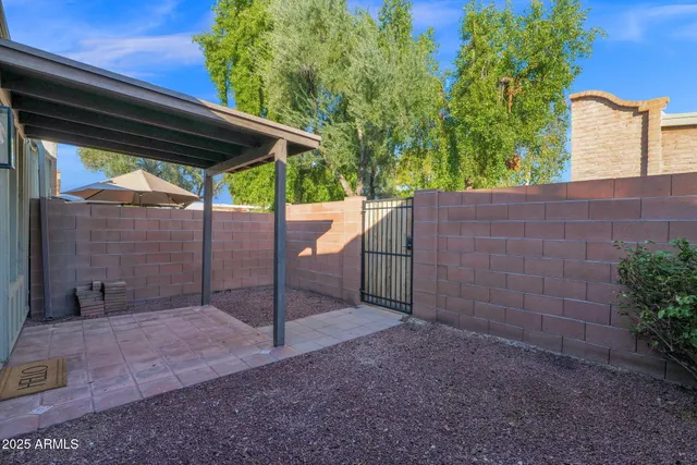 a backyard of a house with lots of green space