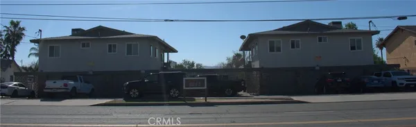a front view of a house with garage