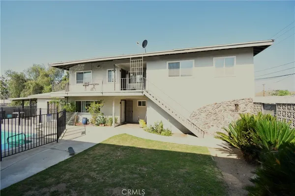 a view of a swimming pool with a couches