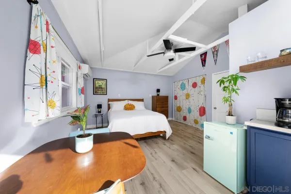 a very nice looking room with wooden floor