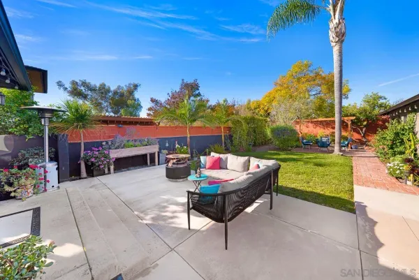 a outdoor space with lots of tables and chairs