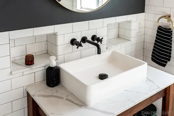 a bathroom with a sink and a shower