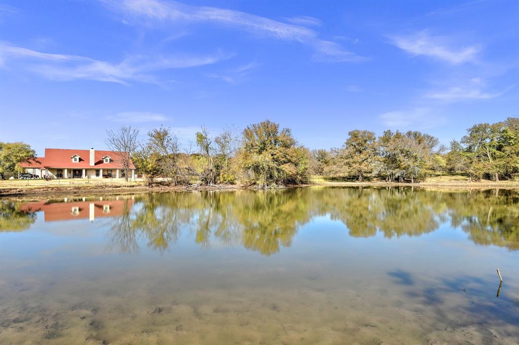 14771 Shearer Road Pilot Point, TX 76258 - Photo 21 of 36 a view of a lake with houses