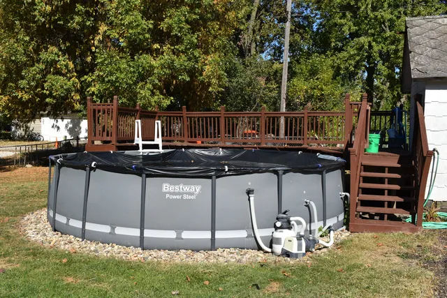 a view of a swimming pool with a patio