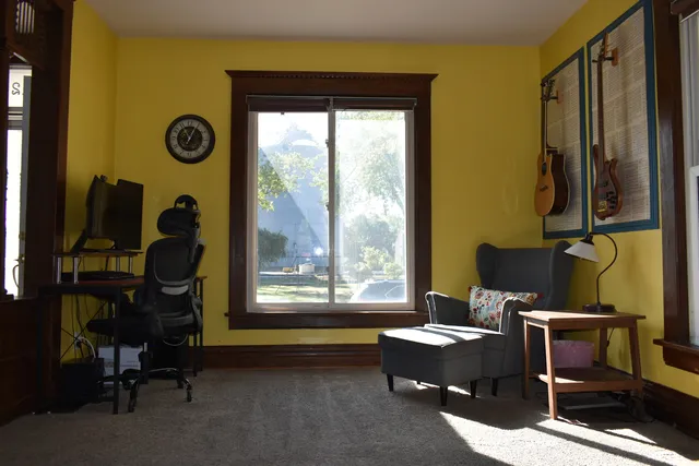 a view of a livingroom with furniture and window