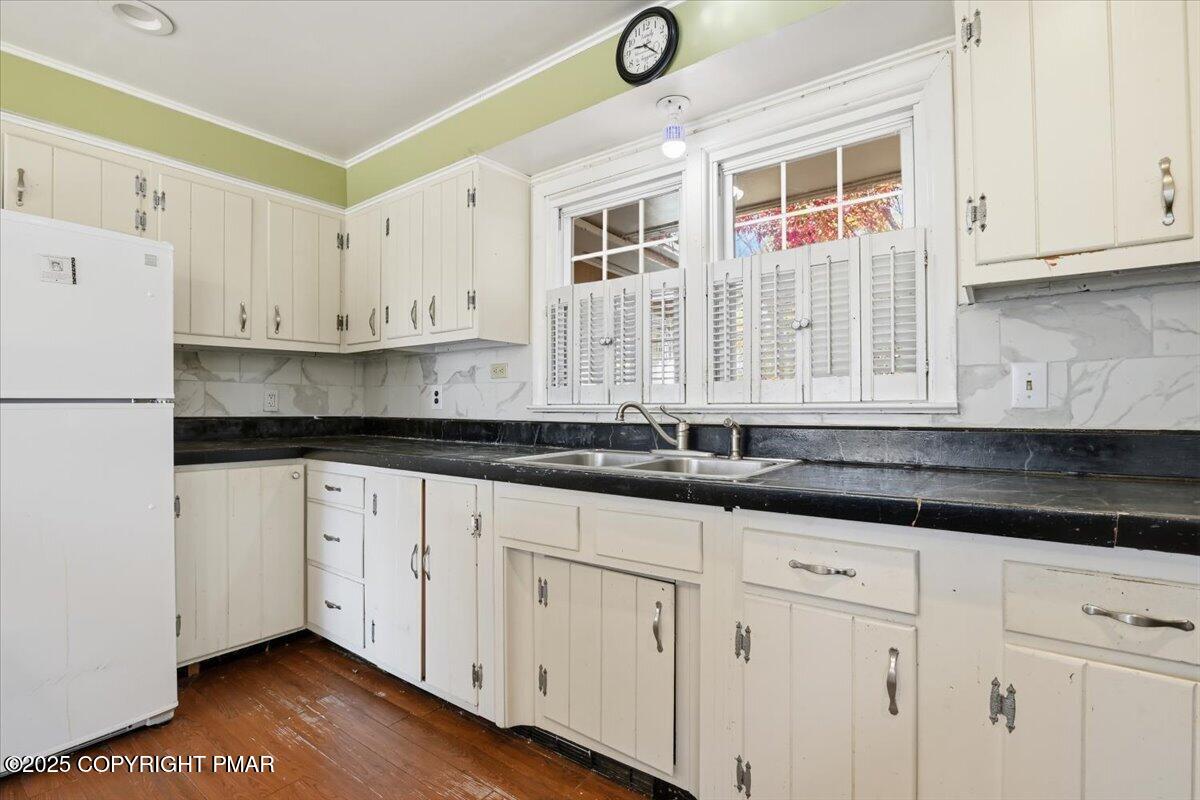 137 Berwick Heights Road East Stroudsburg, PA 18301 - Photo 30 of 88 a kitchen with granite countertop white cabinets and a sink