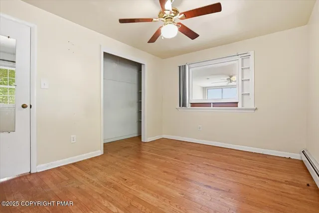 a view of a storage & utility room and utility room