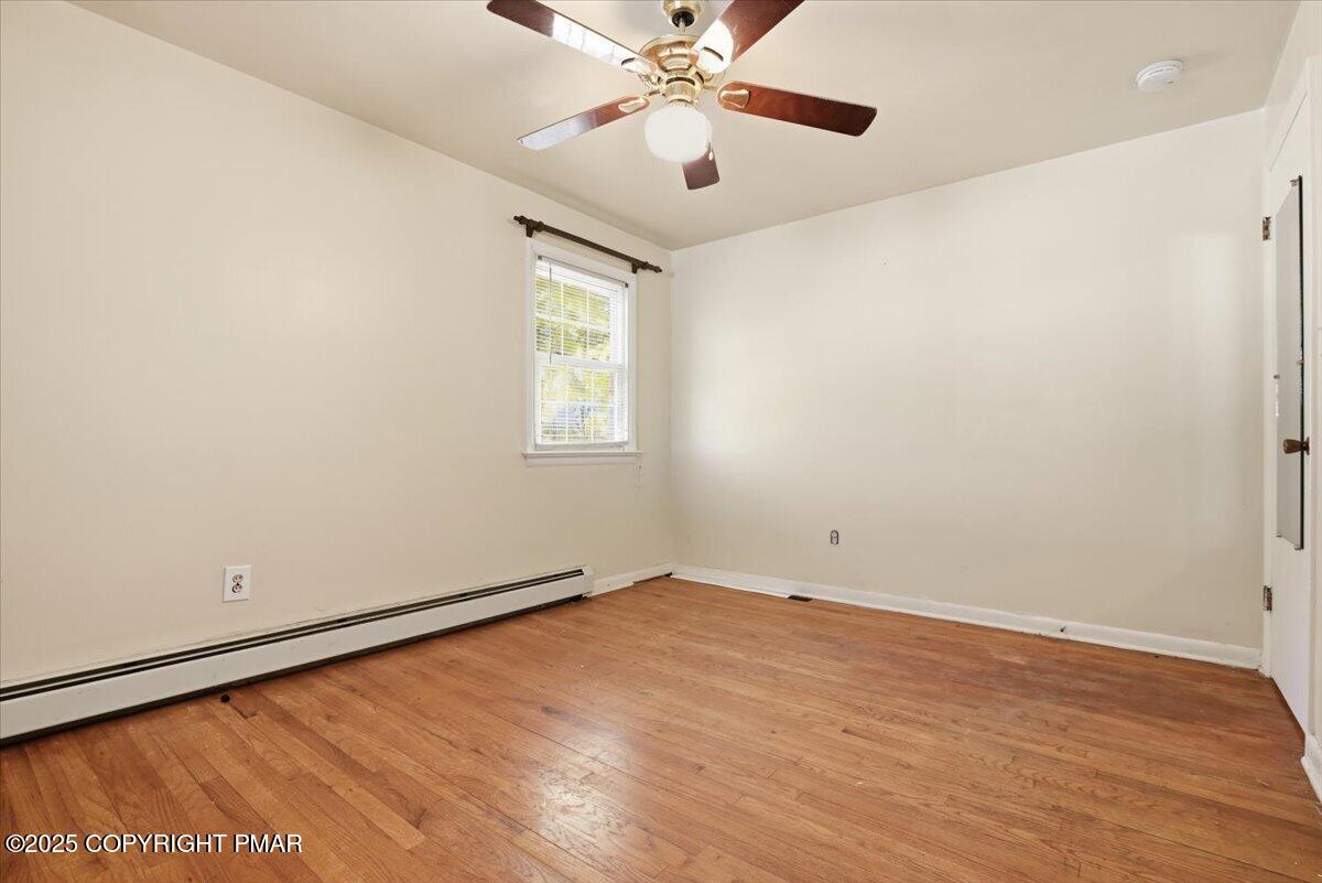 137 Berwick Heights Road East Stroudsburg, PA 18301 - Photo 40 of 88 an empty room with windows and fan