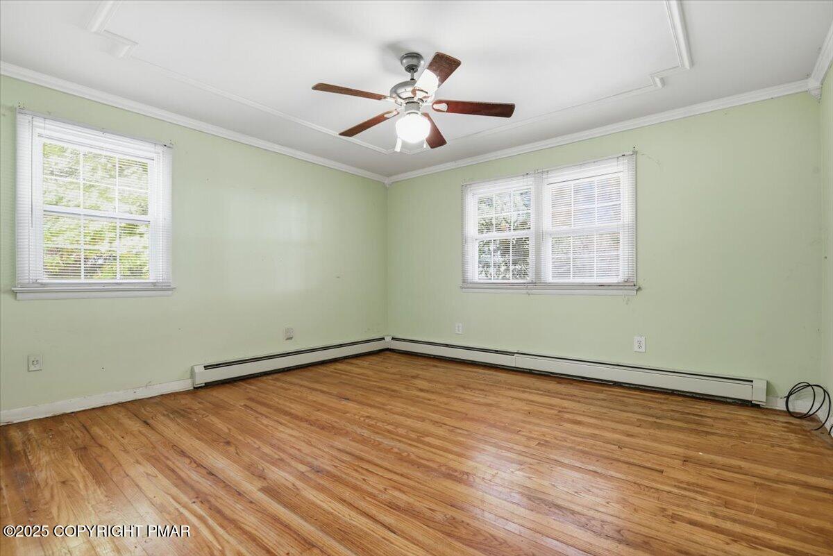 137 Berwick Heights Road East Stroudsburg, PA 18301 - Photo 41 of 88 a view of an empty room with wooden floor and a window