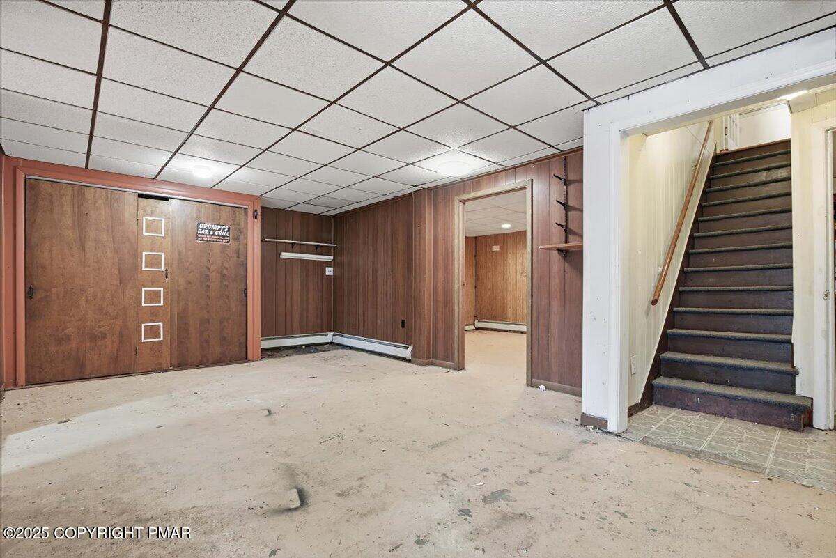 137 Berwick Heights Road East Stroudsburg, PA 18301 - Photo 47 of 88 a view of an empty room with wooden walls