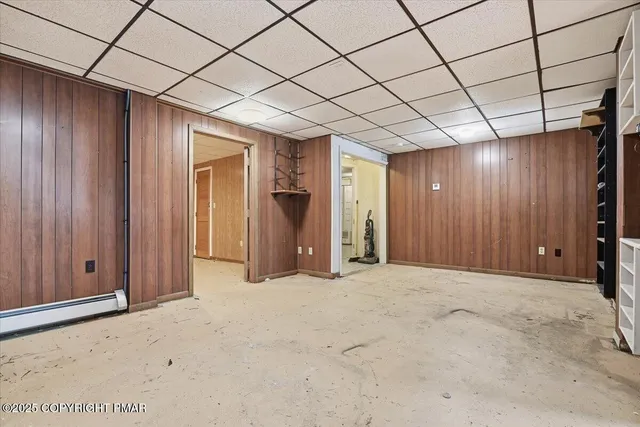 a view of a house with a tree