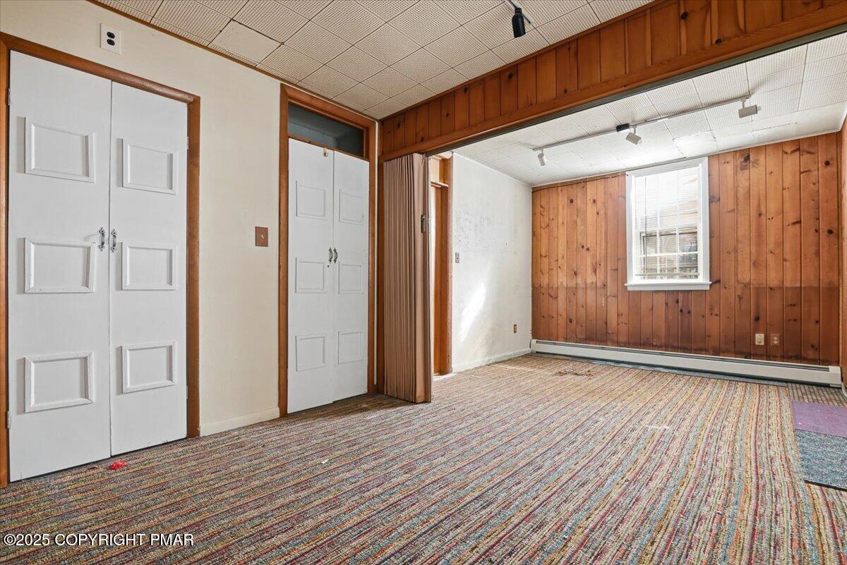 137 Berwick Heights Road East Stroudsburg, PA 18301 - Photo 63 of 88 a view of an empty room with wooden floor and a window