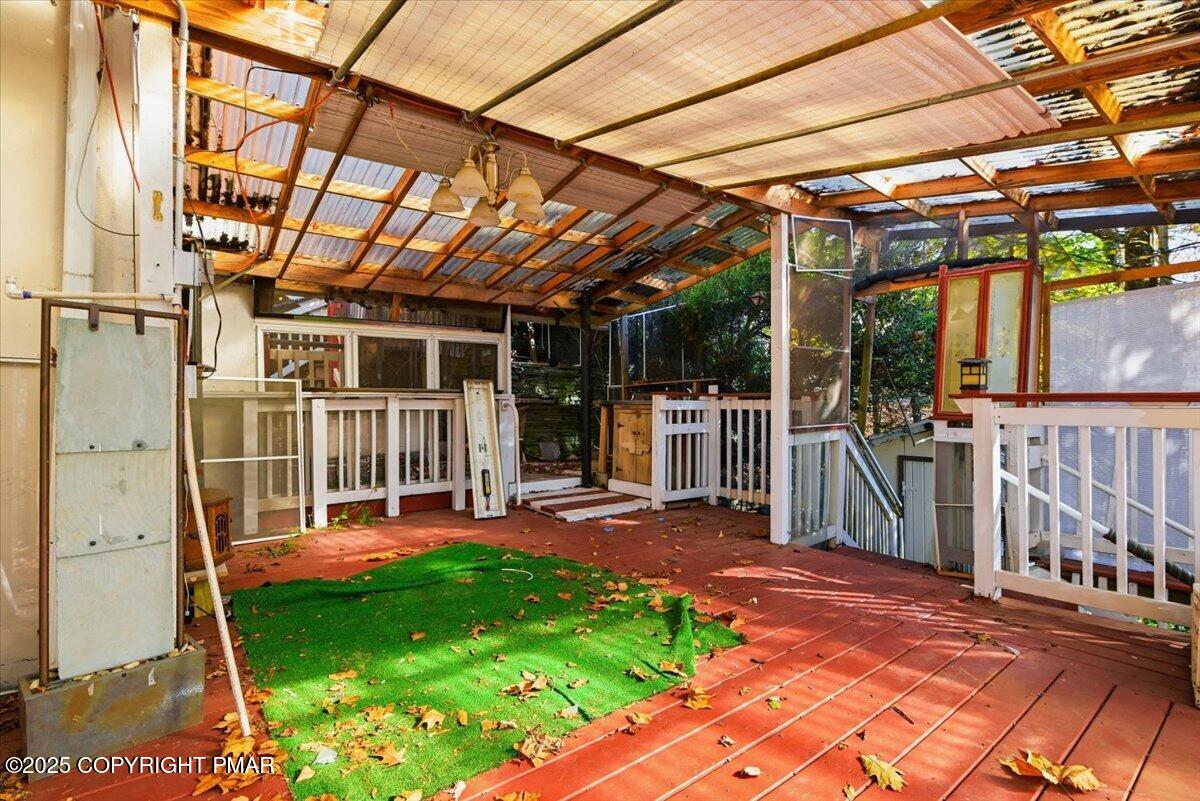 137 Berwick Heights Road East Stroudsburg, PA 18301 - Photo 75 of 88 a view of a patio with table and chairs and potted plants