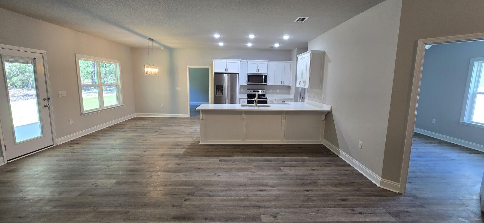 4500 Wolf Track Ridge Crestview, FL 32539 - Photo 5 of 19 a view of kitchen with sink and refrigerator