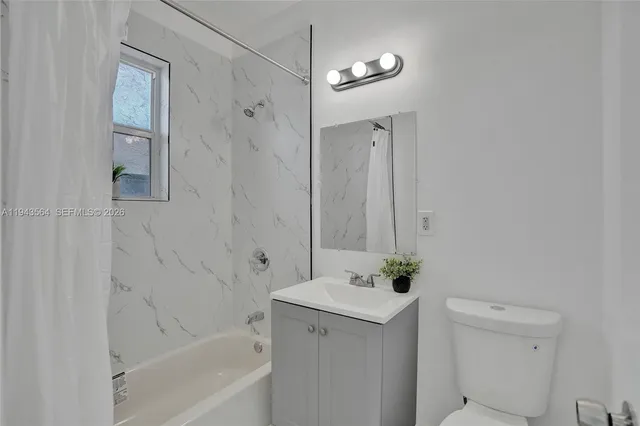 a view of a pathway with a yard