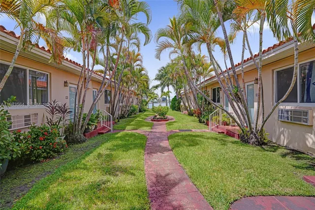 a view of a ocean with tall building