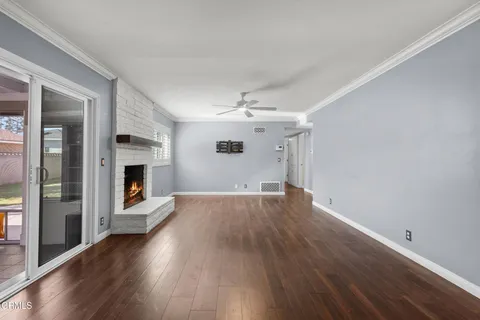 a kitchen with a sink stove and refrigerator