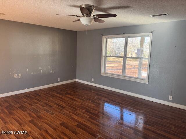 15 Brookwood Loop Adamsville, TN 38310 - Photo 9 of 9 a view of an empty room with wooden floor and a window