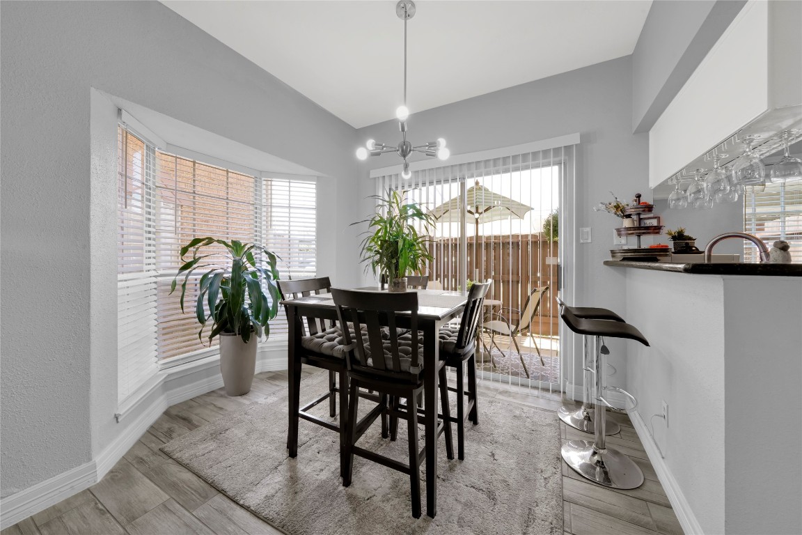 3600 Jeanetta Street, Unit 601 Houston, TX 77063 - Photo 11 of 24 a view of a dining room with furniture window and outside view