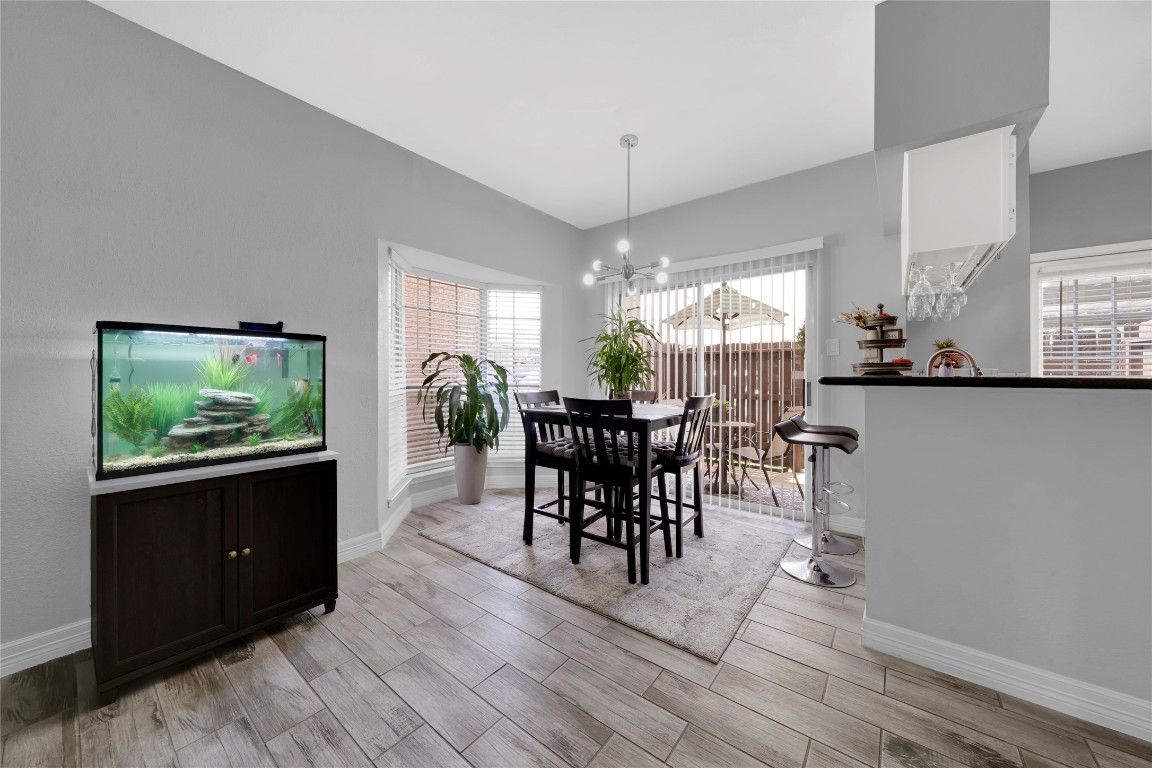 3600 Jeanetta Street, Unit 601 Houston, TX 77063 - Photo 12 of 24 a view of a dining room with furniture window and outside view