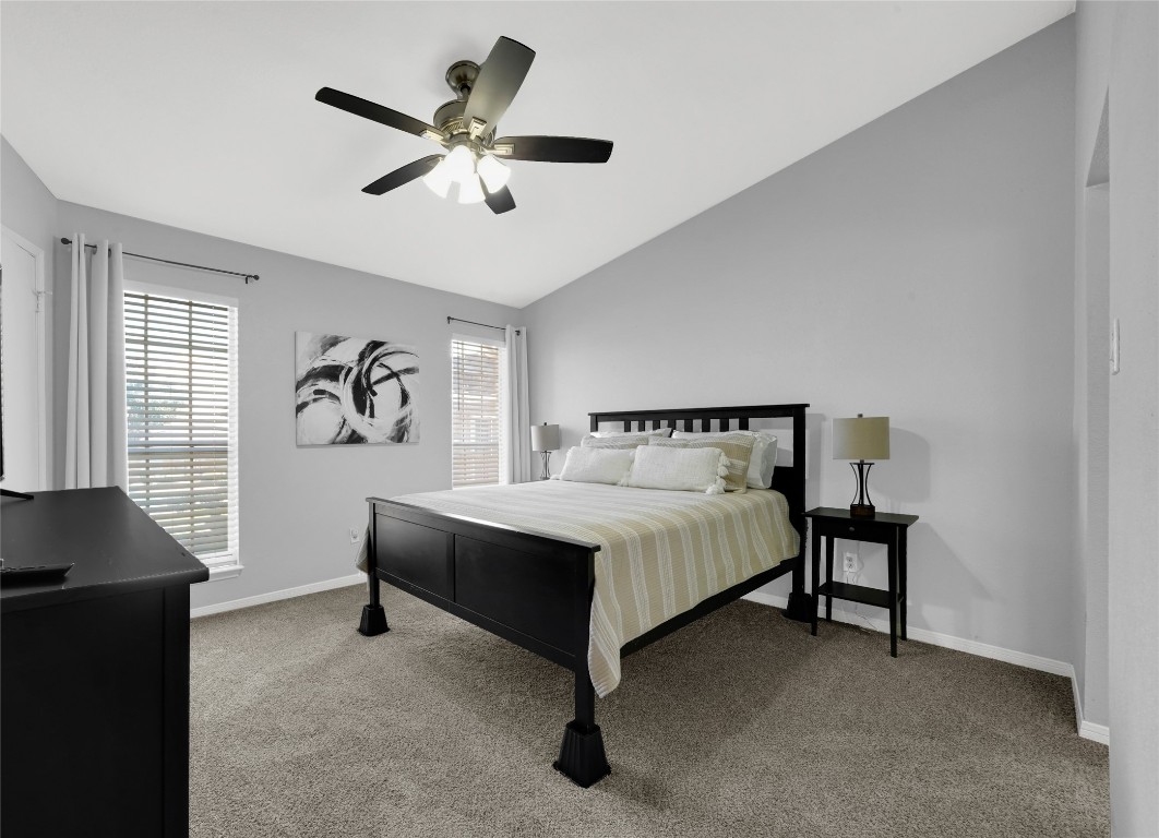 3600 Jeanetta Street, Unit 601 Houston, TX 77063 - Photo 16 of 24 a spacious bedroom with a bed and a desk