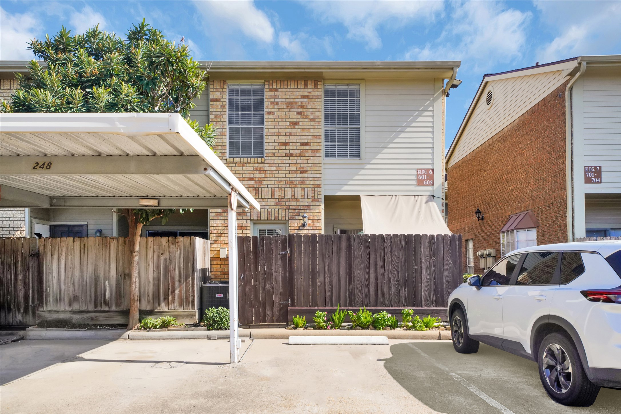 3600 Jeanetta Street, Unit 601 Houston, TX 77063 - Photo 21 of 24 a car parked in front of a house